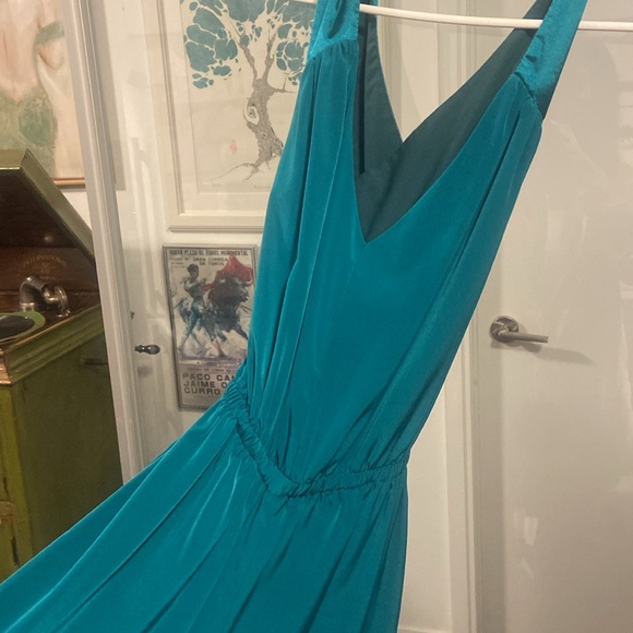 Green jumpsuit. - Picture 2 of 2